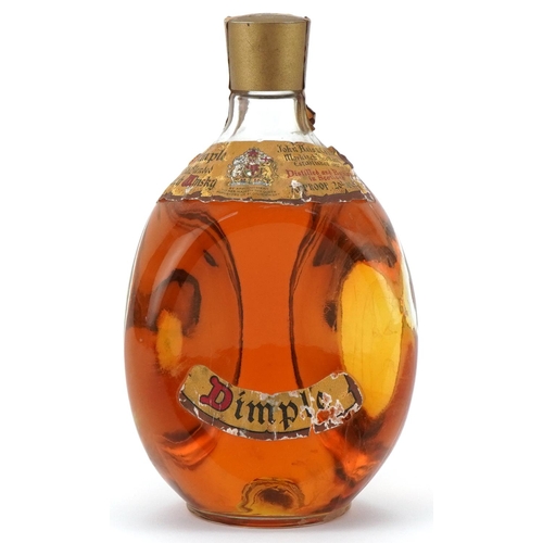 595 - Bottle of Dimple Old Blended Scotch whisky