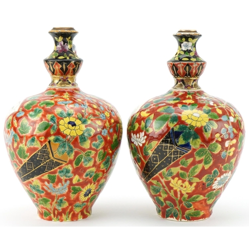  Pair of late 19th century Austro Hungarian Fischer J. pottery ewers with hand painted floral decorat... 