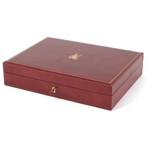 412 - The Empire Collection, twenty five silver replica stamps, gold plated, fitted in a red leather case,... 