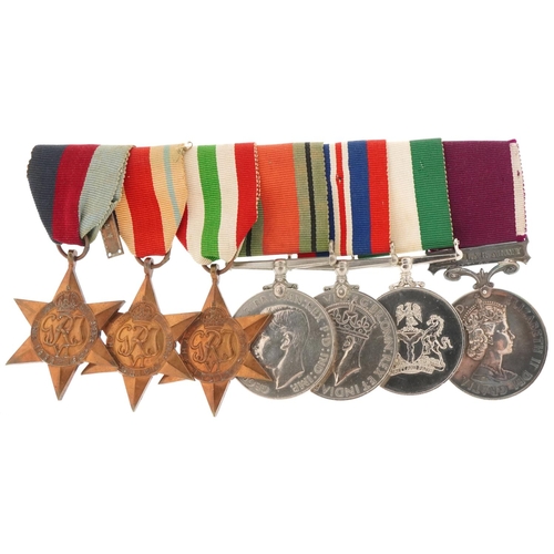 2516 - British military World War II medal group with bar including The Africa Star and Long Service & Good... 