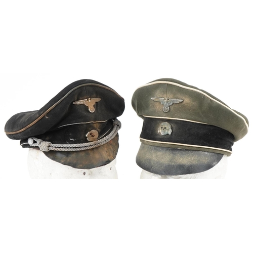 2641 - Two German military interest visor caps with badges