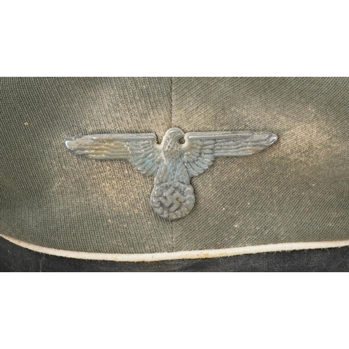 2641 - Two German military interest visor caps with badges