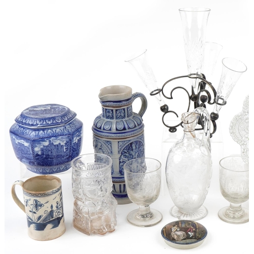 1135 - Mixed group of glassware and pottery items including ewers, jugs and a footed plate, the largest jug... 