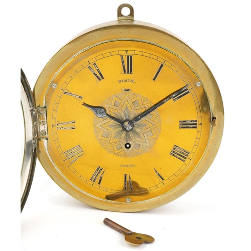 232 - Late 19th century brass cased ship's clock by Benzie of Cowes, the circular dial engraved and with R... 