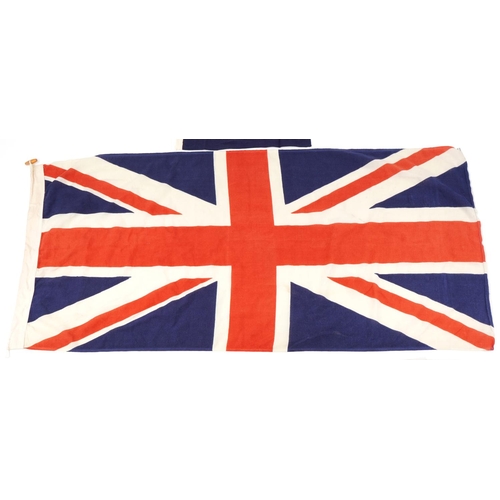 2625 - 20th century Union Jack flag, 68cm x 40cm, together with a small RNLI flag with toggle, 28cm x 43cm