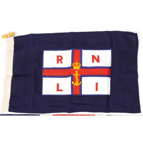 2625 - 20th century Union Jack flag, 68cm x 40cm, together with a small RNLI flag with toggle, 28cm x 43cm