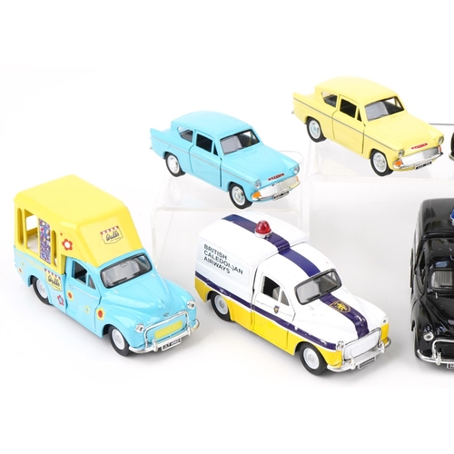 2046 - Collection of nine Saico diecast models including a Police dog patrol van and an ice cream vase