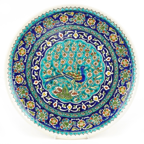 260 - Late 20th century Turkish pottery wall plaque with polychrome decoration, diameter 38cm