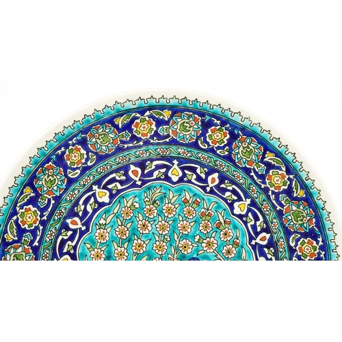 260 - Late 20th century Turkish pottery wall plaque with polychrome decoration, diameter 38cm