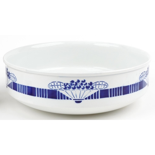 319 - French Art Deco four piece blue and white pottery wash set, the bowl 32cm in diameter