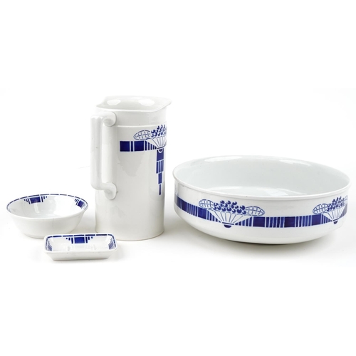 319 - French Art Deco four piece blue and white pottery wash set, the bowl 32cm in diameter