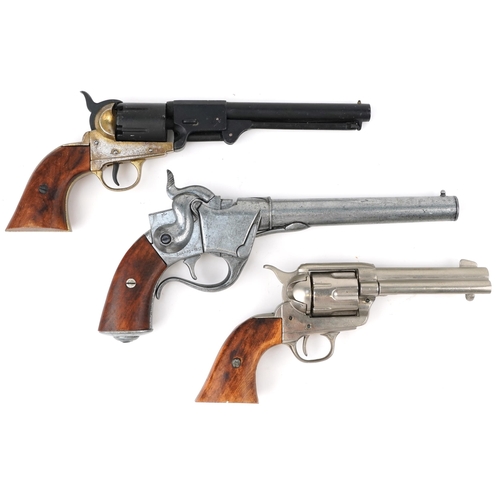 2747 - Two decorative model revolvers and one other, the largest 31cm in length