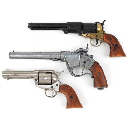 2747 - Two decorative model revolvers and one other, the largest 31cm in length