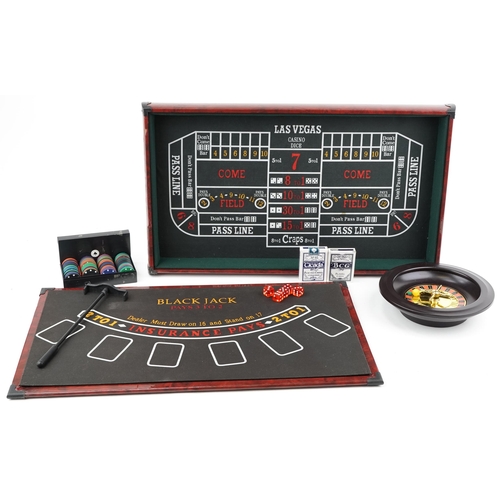 2042 - Casino games compendium including roulette and Black Jack, 73cm in length