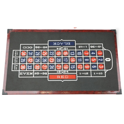 2042 - Casino games compendium including roulette and Black Jack, 73cm in length