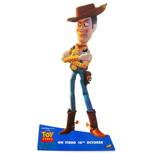 2469 - Three large Toy Story cardboard cut-out advertising boards of Woody and Buzz Lightyear and a hanging... 