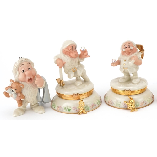 512 - Six Lenox porcelain Disney Dwarf trinkets and one other, the trinkets each housing a charm, 10cm hig... 