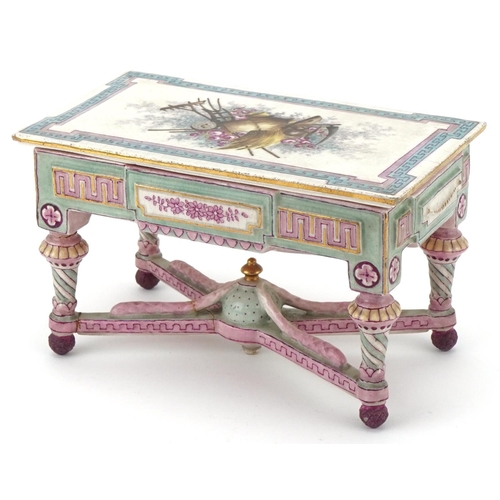 33 - 19th century French porcelain and painted doll's house centre table, the removable lid decorated wit... 