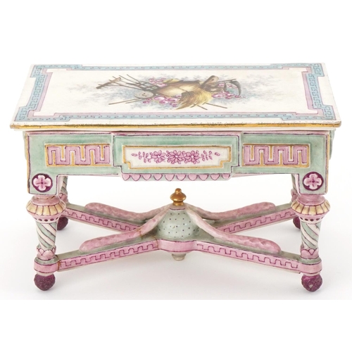 33 - 19th century French porcelain and painted doll's house centre table, the removable lid decorated wit... 