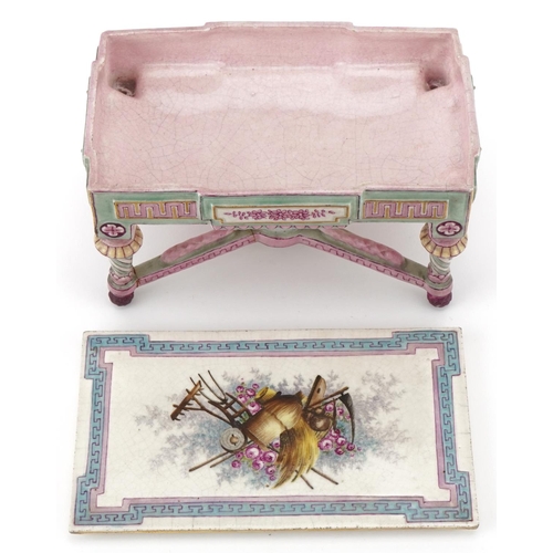 33 - 19th century French porcelain and painted doll's house centre table, the removable lid decorated wit... 