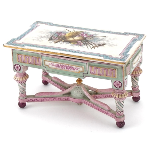 33 - 19th century French porcelain and painted doll's house centre table, the removable lid decorated wit... 