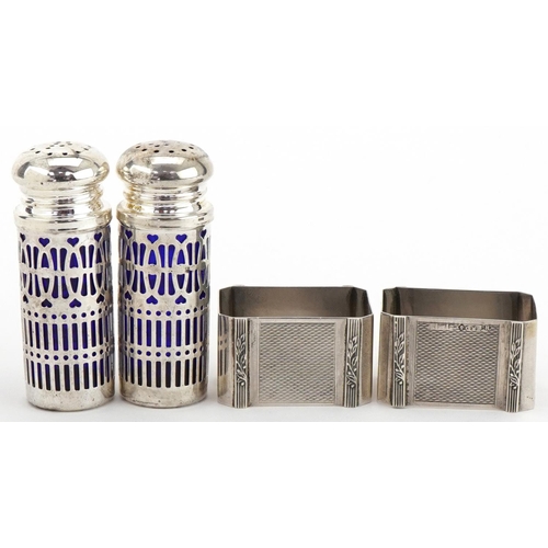 436 - Pair of silver napkin rings, Birmingham, 1989, by Harman Brothers, 4.5cm wide, 43.5g, together with ... 