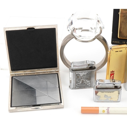 1224 - Small collection of mixed collector's items including lighters, a jewellery shop display ring and ci... 