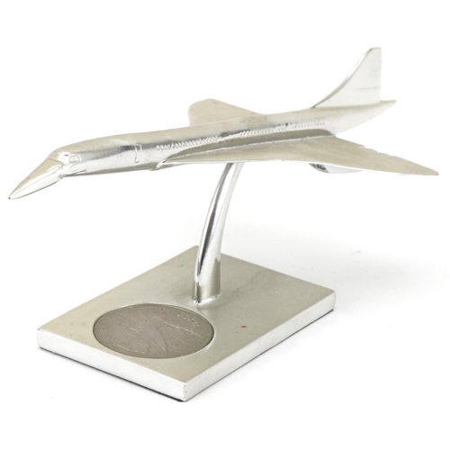 2412 - Royal Mint Concorde desk stand with inset five dollar coin together with a picture of Concorde, the ... 