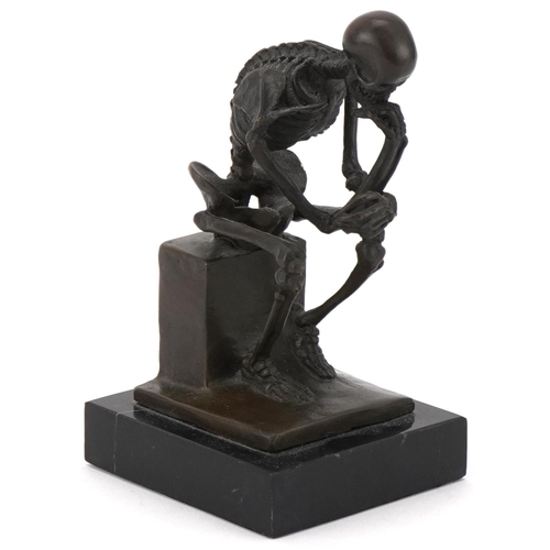 128 - Skeleton 'The Thinker' 20th century bronze after Rodin by Milo, on a marble base, H-15cm