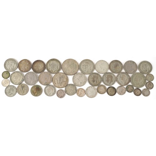 2100 - Pre 1947 silver coins to include half crowns, florins and shillings, weight 286.4g