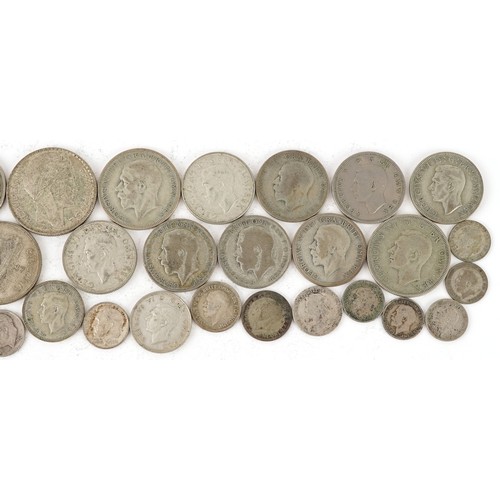 2100 - Pre 1947 silver coins to include half crowns, florins and shillings, weight 286.4g