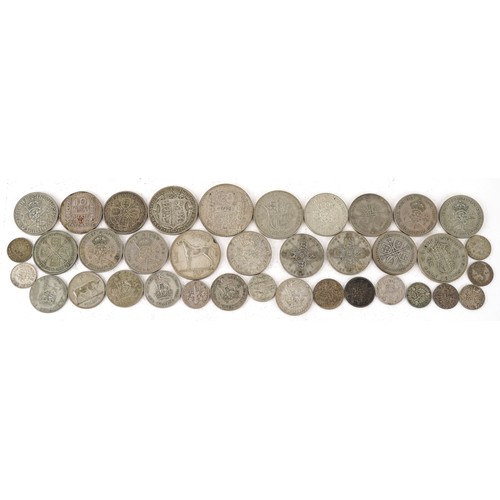 2100 - Pre 1947 silver coins to include half crowns, florins and shillings, weight 286.4g