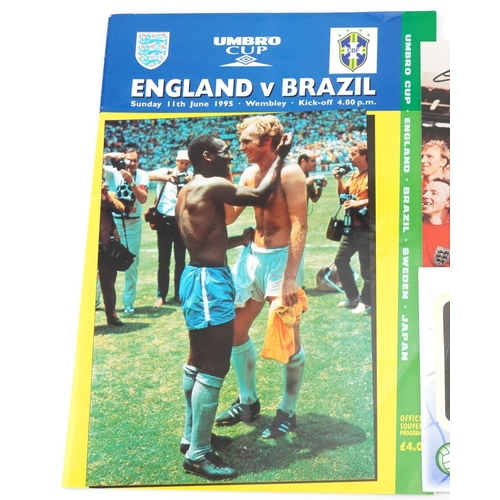 2397 - Signed photograph of Geoff Hurst from the 1966 World Cup, England v Brazil 1995 football programme a... 