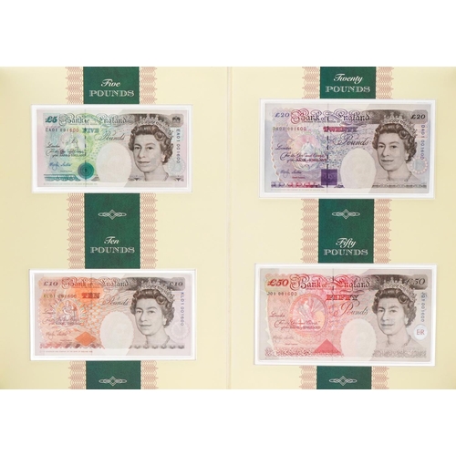 2242 - Limited edition set of four English banknotes with matching numbers comprising five pounds, ten poun... 