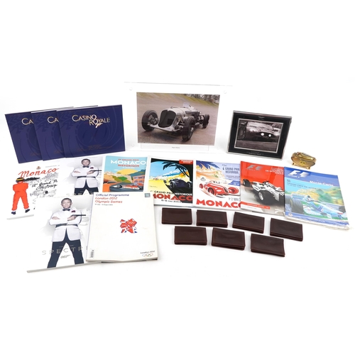 2400 - Ephemera including seven Aston Martin leather wallets, Monaco Grand Prix programmes, 007 Spectre Wor... 