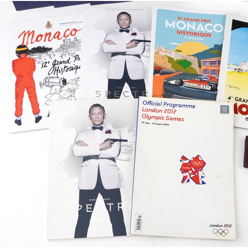 2400 - Ephemera including seven Aston Martin leather wallets, Monaco Grand Prix programmes, 007 Spectre Wor... 