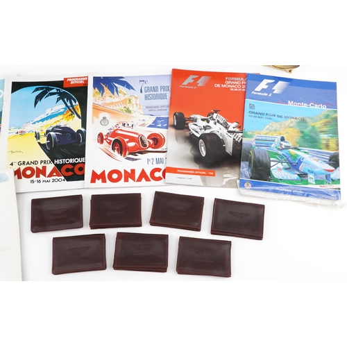 2400 - Ephemera including seven Aston Martin leather wallets, Monaco Grand Prix programmes, 007 Spectre Wor... 