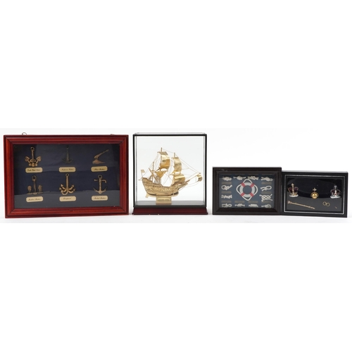 1160 - Group of four display cases, containing model of a ship, types of knots, various anchors and crown j... 