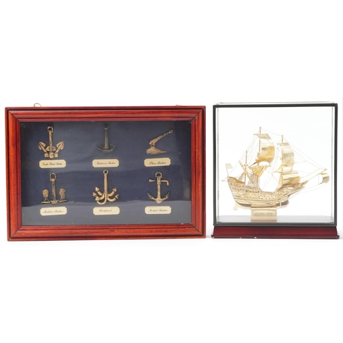 1160 - Group of four display cases, containing model of a ship, types of knots, various anchors and crown j... 