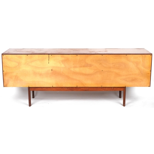 1023 - Mid 20th century teak sideboard manufactured by White & Newton Ltd, Portsmouth, fitted with three ce... 