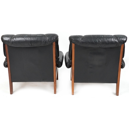 1022 - Pair of mid to late 20th century black leather and teak 'Safari' style lounge chairs, 88cm H x 92cm ... 