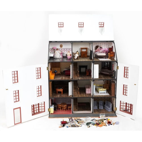 1105 - Mid to late 20th century doll's house, 92cm H x 82cm W x 46cm D, together with a collection of doll'... 