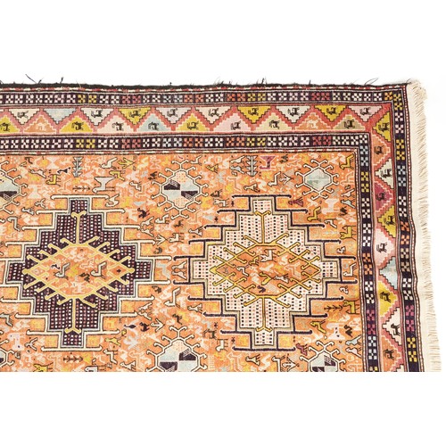 1020 - Rectangular Turkish hand made silk and wool rug by Tribal Arts Carpeting having allover geometric an... 