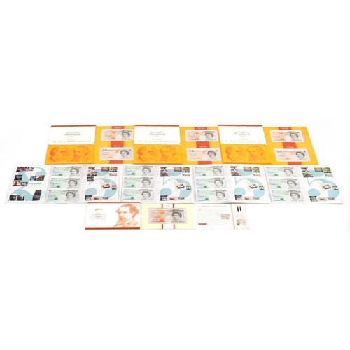 2237 - Five pound and ten pound notes with consecutive prefix numbers and identical serial numbers housed i... 