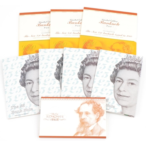 2237 - Five pound and ten pound notes with consecutive prefix numbers and identical serial numbers housed i... 