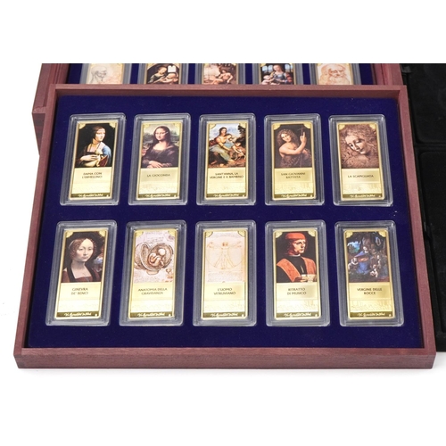 2173 - Three boxed sets of commemorative medallions to include a boxed set of twenty Leonardo da Vinci rect... 