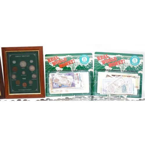 2184 - Two framed sets of British coinage including decimal and pre decimal and world banknotes and approxi... 