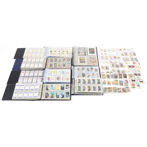 2304 - Collection of cigarette cards and tea cards, some arranged in albums, including a set of fifty John ... 