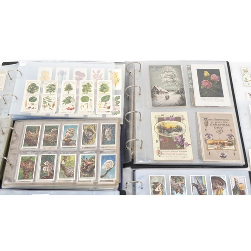 2304 - Collection of cigarette cards and tea cards, some arranged in albums, including a set of fifty John ... 