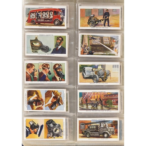 2304 - Collection of cigarette cards and tea cards, some arranged in albums, including a set of fifty John ... 